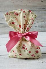 Fabric pouch on old wooden table