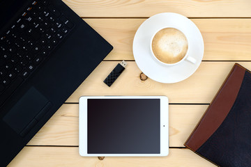 Fototapeta na wymiar Laptop, tablet, diary, cup of coffee - business concept