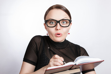 Surprised business woman in glasses