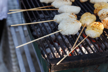 grilling glutinous rice on brazier