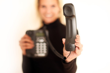 Frau mit Telefonhörer