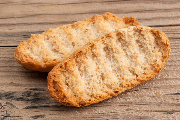 Rusks on old wooden table