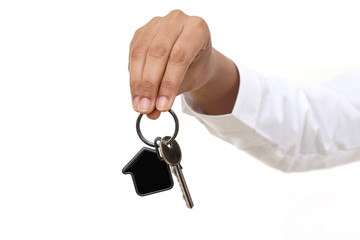 House shape in business woman hand