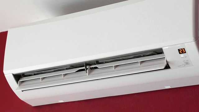 Split-system air conditioner on wall
