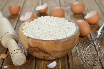 Flour in a wooden bowl
