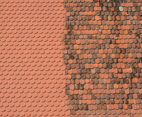 New against old roof tiles - Roof renovation concept