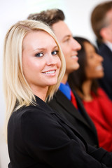 Business: Woman With Business Co-Workers