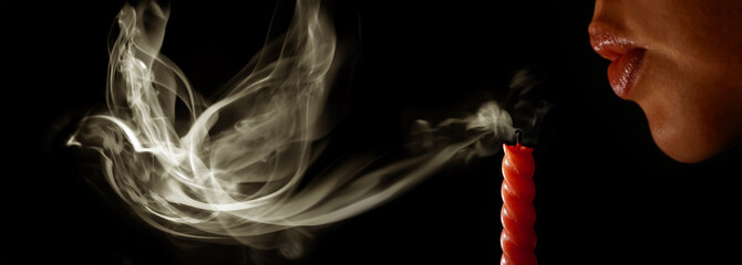 Woman blows out a candle and the smoke becomes to a bird