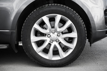 Modern automotive wheel on light alloy disc