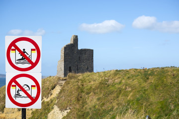 warning signs for surfers at ballybunion castle