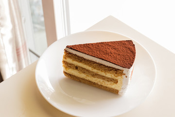 tiramisu topping with cocoa powder