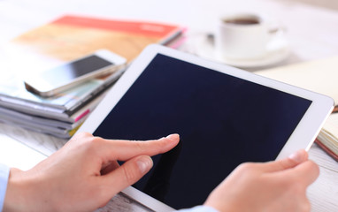 Digital tablet computer with isolated screen in female hands