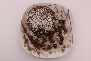 Chocolate donut and chocolate balls with cocoa powder