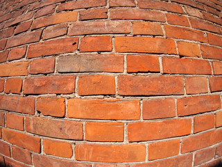 Red brick wall with distortion lens