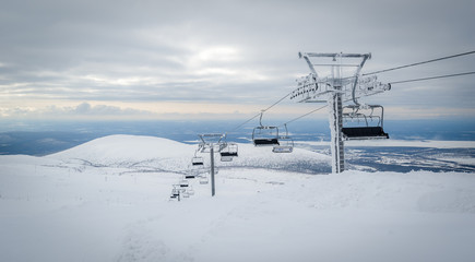 Fototapeta na wymiar Ski lift cable way in the mountains