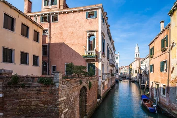 Fotobehang Canal in Venice, Italy. © norbel
