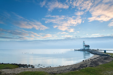 white lighthouse in morning