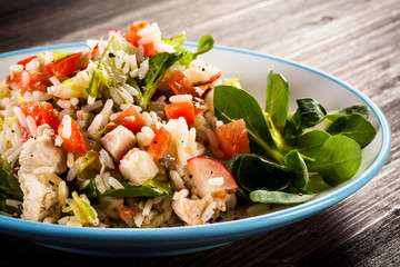 Roasted white meat, rice and vegetables