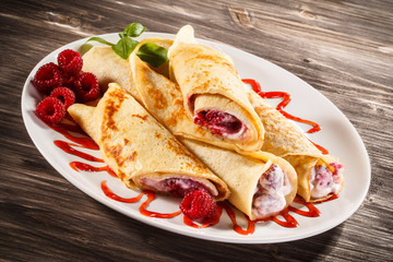 Crepes with raspberries and cream