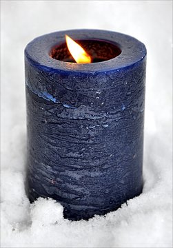 Blue Candle In The Snow