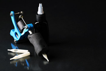 Machine for tattoo, on dark  background