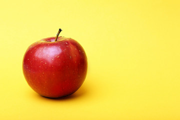 Apple on color background