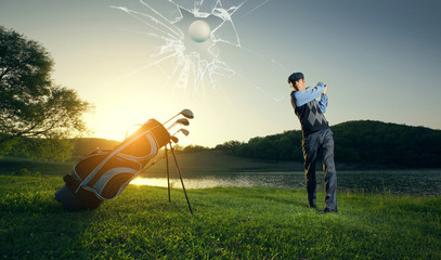 Golfer bounce breaks screen glass. Playing golf in countryside