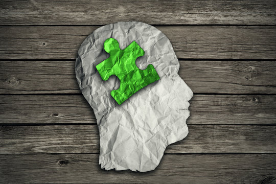 Puzzle head solution concept. Mental health symbol