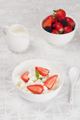 cottage cheese with fresh strawberries in the bowl
