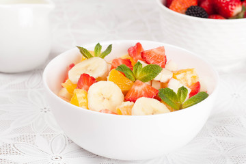 Fruit and berry salad for breakfast, horizontal, closeup