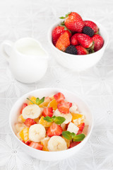 Fruit and berry salad for breakfast