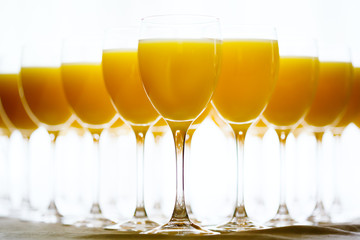 Row of Glasses with Fresh Orange Juice