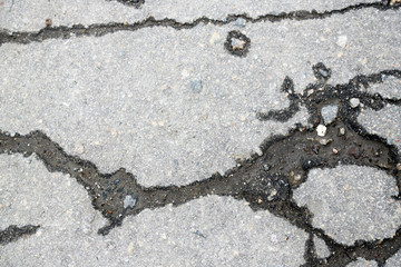 Broken asphalt close up
