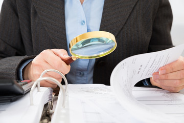 Businessperson Checking Bills