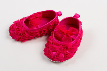 pair of cute baby shoes for a girl
