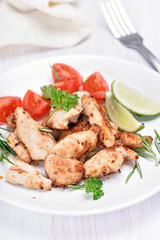 Slices chicken meat with vegetables