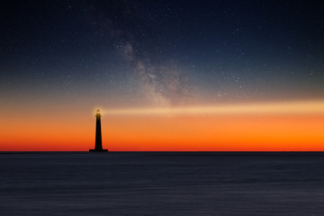 Lighthouse against night sky