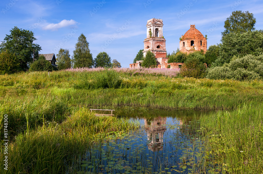 Canvas Prints Russian landscape with small tranquil river and old church in th