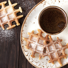 Fresh waffles with coffee cup