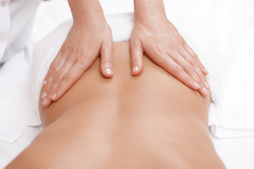 Fototapeta premium Woman gets back massage