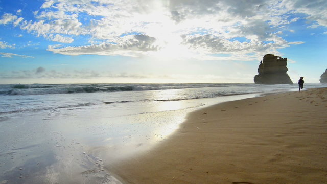 The Great Ocean Road, Woman running at the beach