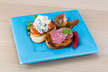 Tapas with cheese and salami