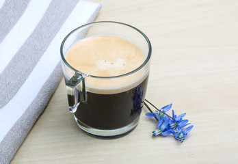 Espresso with spring flower