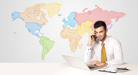 Business man with colorful world map background