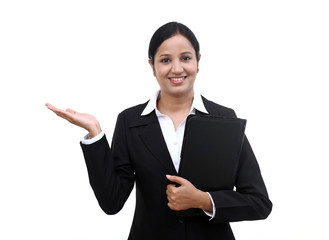 Young businesswoman holding file