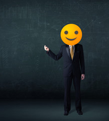 businessman wears yellow smiley face