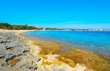 grey rocks and blue water