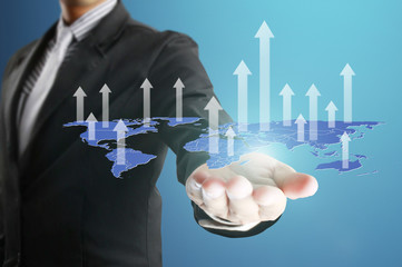 businessman with financial symbols coming