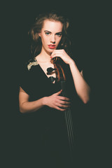 Gorgeous Lady Musician Holding on her Cello © ysbrandcosijn