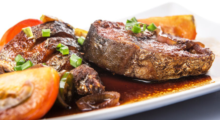 Malaysian dish deep fried mackerel tuna fish with soy sauce